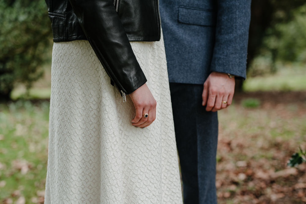 Outdoor Farm Field Marquee Groom Bride Leather Jacket Blue Suit Modern Green Yellow Bouquet | Rustic and Relaxed Spring Tipi Wedding Inbetween Days Photography