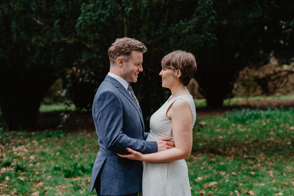 Outdoor Farm Field Marquee Groom Bride Jesus Peiro Blue Suit Modern | Rustic and Relaxed Spring Tipi Wedding Inbetween Days Photography