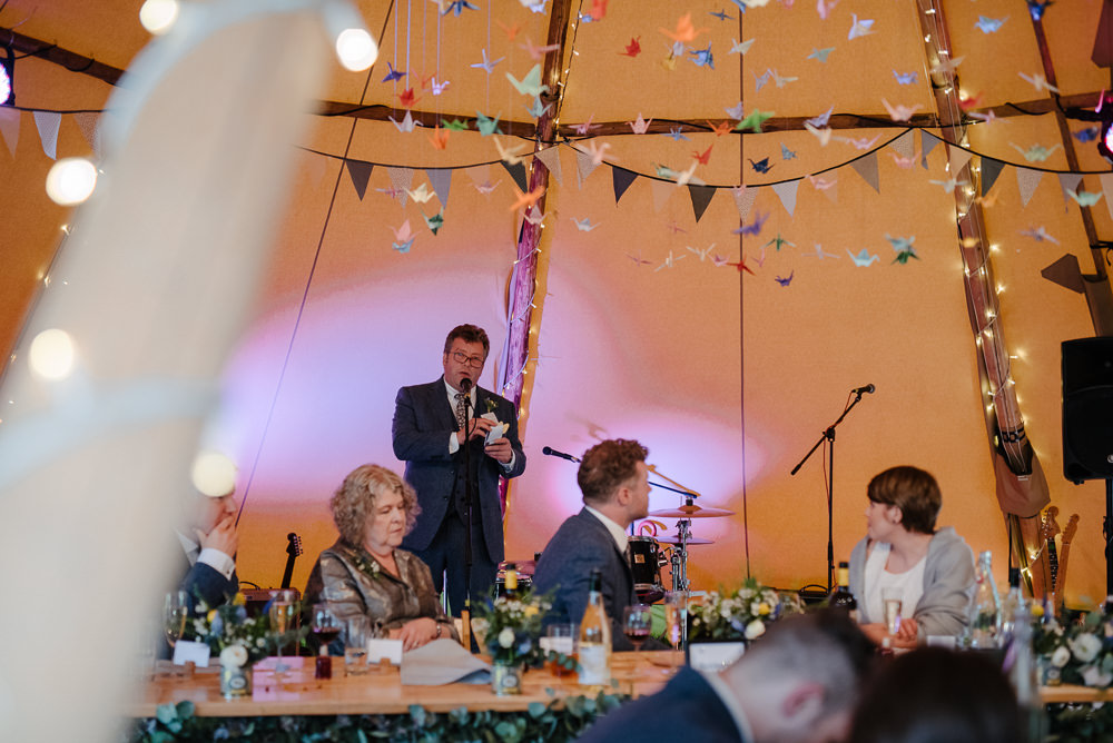 Outdoor Farm Field Marquee Decor Origami Cranes Speeches Reception Dinner | Rustic and Relaxed Spring Tipi Wedding Inbetween Days Photography