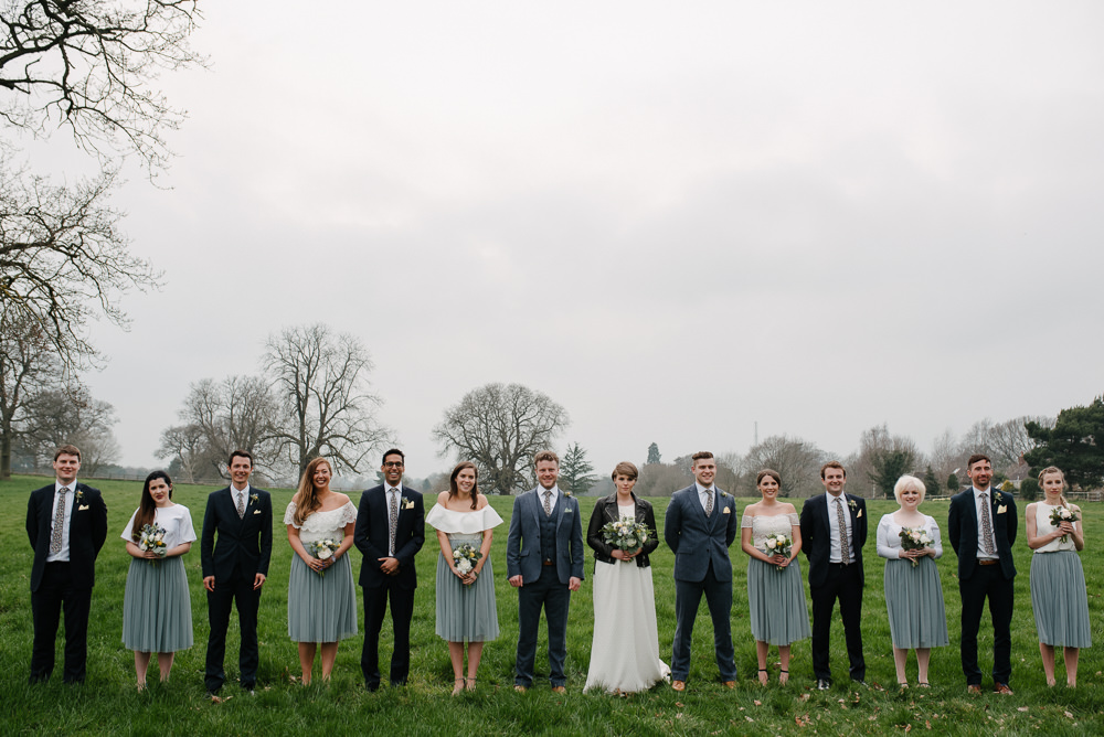 Outdoor Farm Field Marquee Bridesmaids White Grey Separates Group Bride Groom Groomsmen Navy Suits | Rustic and Relaxed Spring Tipi Wedding Inbetween Days Photography