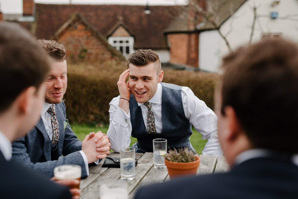 Outdoor Farm Field Marquee Blue Yellow White Groomsmen Pub | Rustic and Relaxed Spring Tipi Wedding Inbetween Days Photography