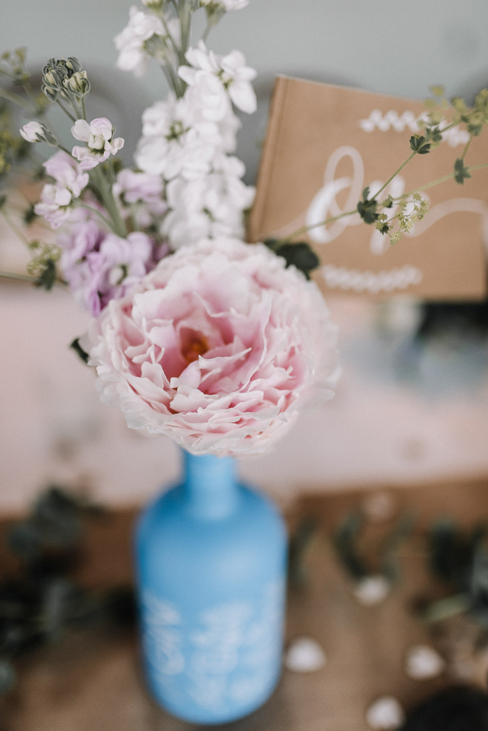 Gin Bottle Flowers Table Pretty Pink Greenery Decor Stone Barn Wedding Oobaloos Photography