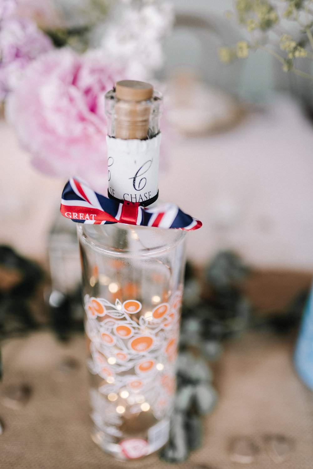 Gin Bottle Flowers Table Pretty Pink Greenery Decor Stone Barn Wedding Oobaloos Photography
