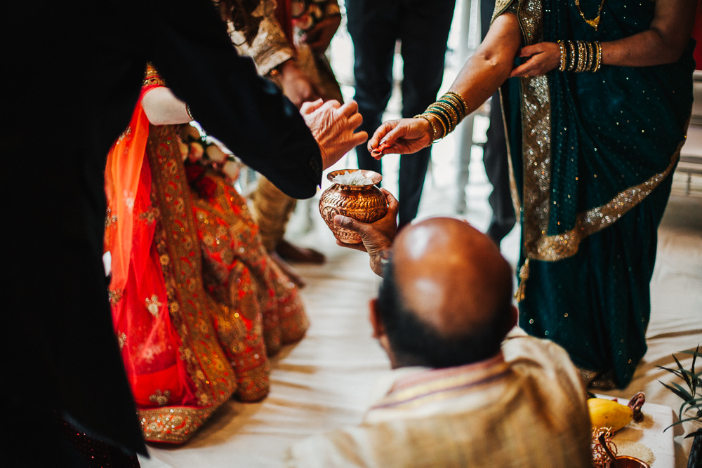 Styal Lodge Multicultural English Orange Pink Mandap Ceremony Traditional Ritual Aisle Bride Groom | Modern and Colorful Indian Wedding Emilie May Photography