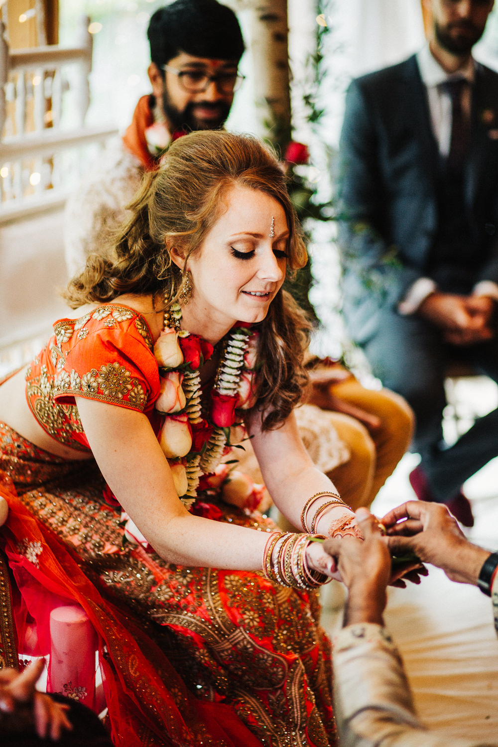 Styal Lodge Multicultural English Orange Pink Mandap Ceremony Traditional Ritual Aisle Bride Groom | Modern and Colorful Indian Wedding Emilie May Photography