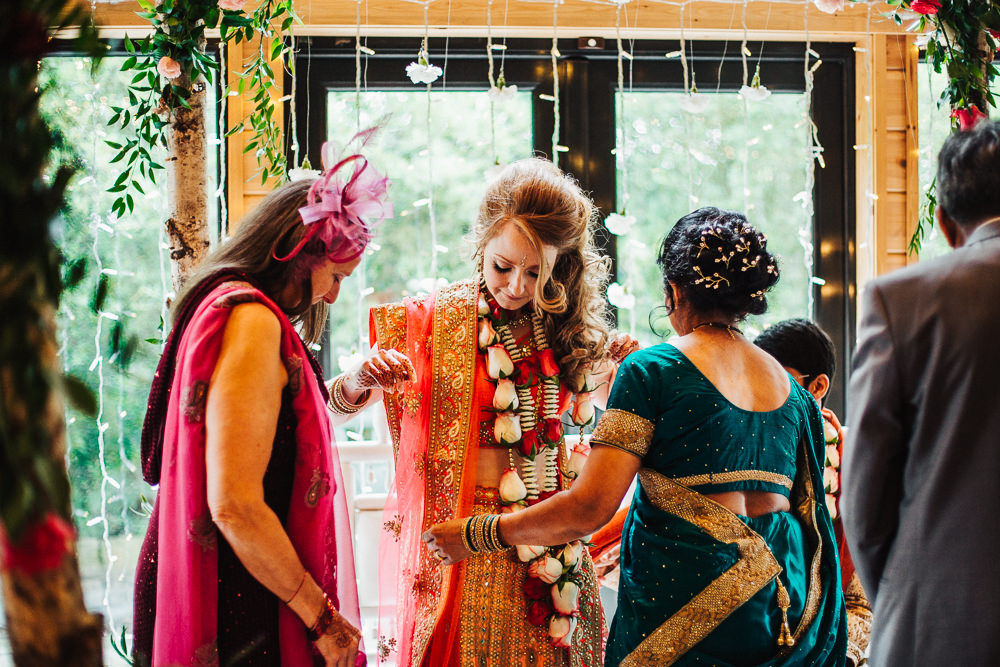 Styal Lodge Multicultural English Orange Pink Mandap Ceremony Traditional Ritual Aisle Bride Groom | Modern and Colorful Indian Wedding Emilie May Photography