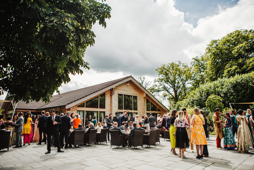 Styal Lodge Multicultural English Outdoor Reception Drinks | Modern and Colorful Indian Wedding Emilie May Photography