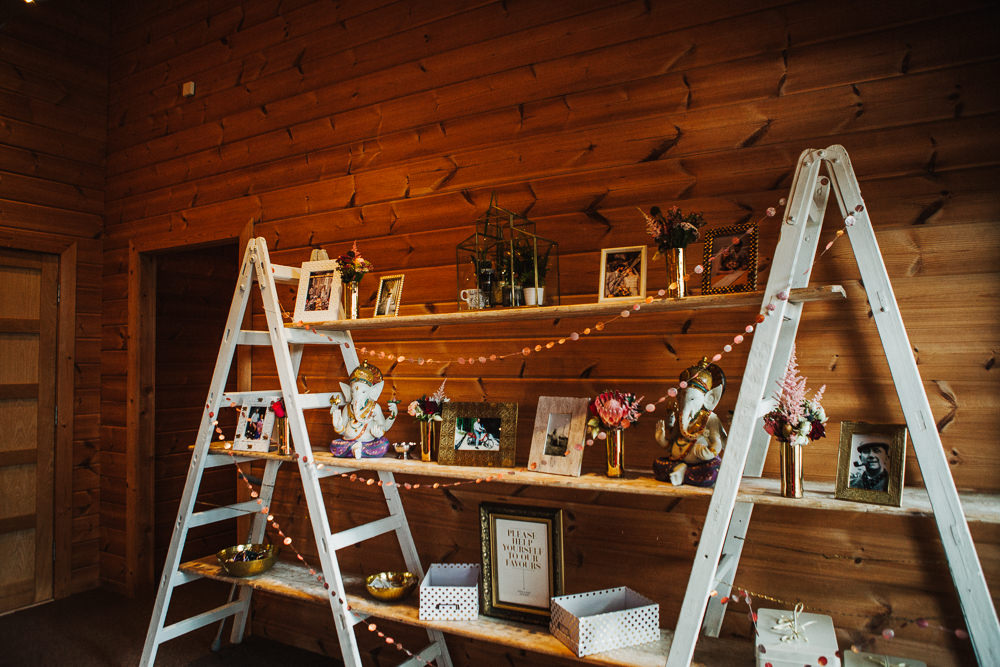 Styal Lodge Multicultural English Rustic Ladder Photos Ganesh Statues | Modern and Colorful Indian Wedding Emilie May Photography