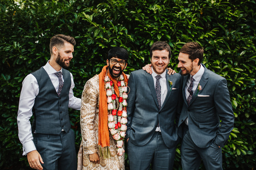 Styal Lodge Multicultural English Orange Pink Groom Grey Groomsmen Suits | Modern and Colorful Indian Wedding Emilie May Photography