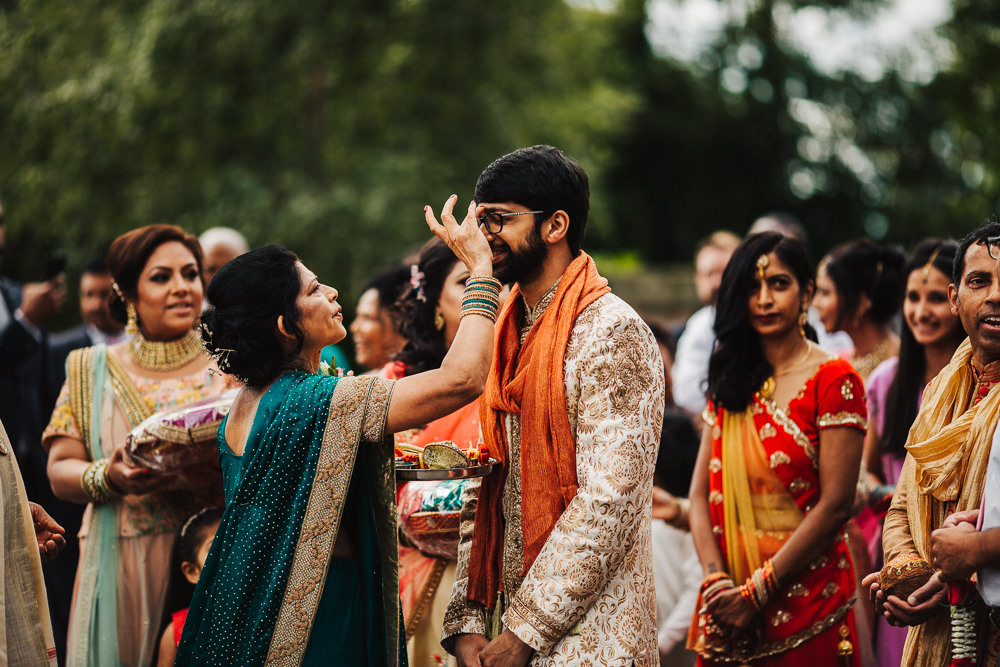 Styal Lodge Multicultural English Orange Pink Groom Bindi Henna | Modern and Colorful Indian Wedding Emilie May Photography