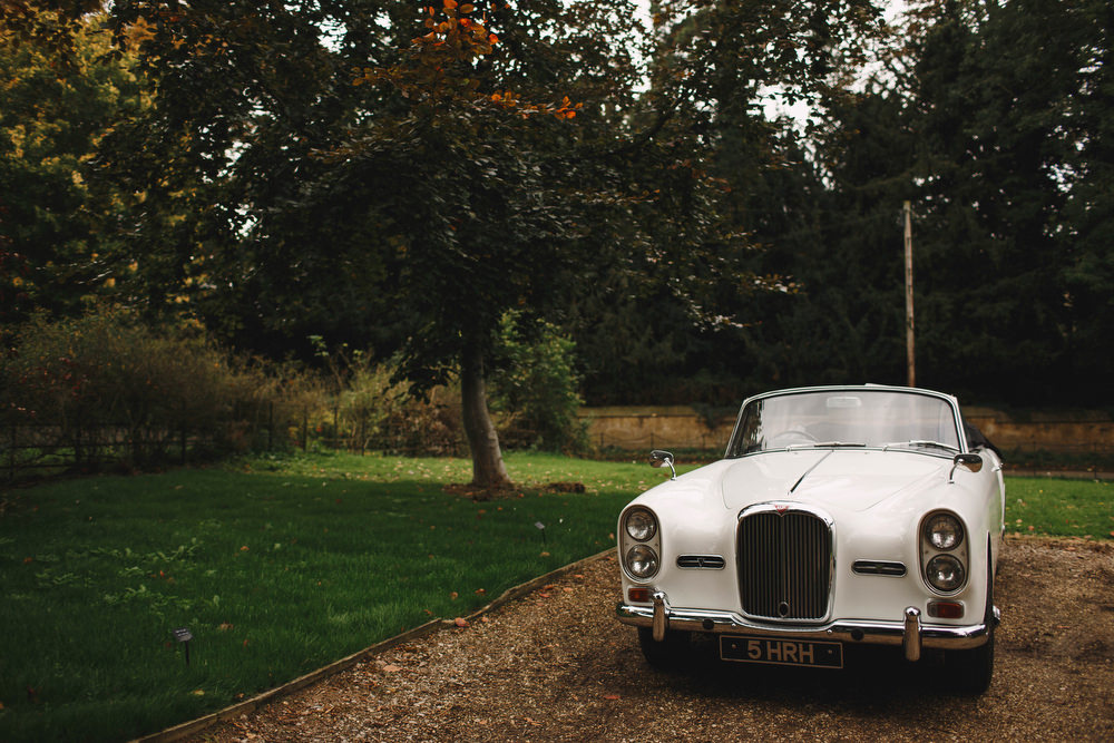 Cotswolds Royal Castle Summer Autumn Elegant Traditional White Classic Car | Sudeley Castle Wedding ARJ Photography