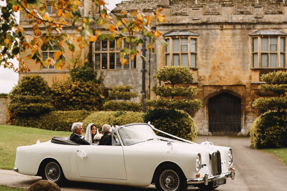 Cotswolds Royal Castle Summer Autumn Traditional Classic Elegant Black Tie White Rose Bride Father White Car | Sudeley Castle Wedding ARJ Photography