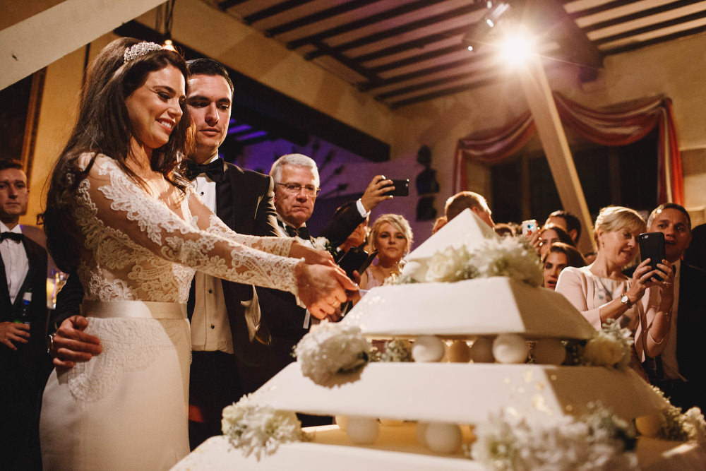 Cotswolds Royal Castle Summer Autumn Traditional Classic Elegant Bride Groom Dinner Reception Pyramid Cake Cutting | Sudeley Castle Wedding ARJ Photography
