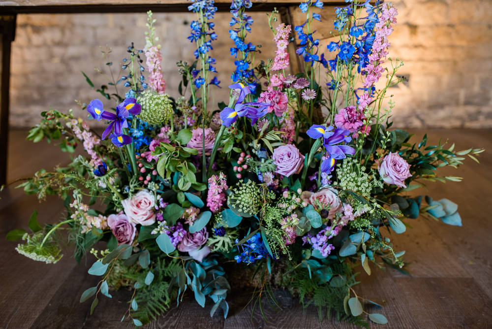 Iris Rose Delphiniums Backdrop Lilac Greenery Hoop Wreath Foliage Table Meadow Purple Ultra Violet Wedding Moon Gate Flower Arch Captured by Katrina Photography
