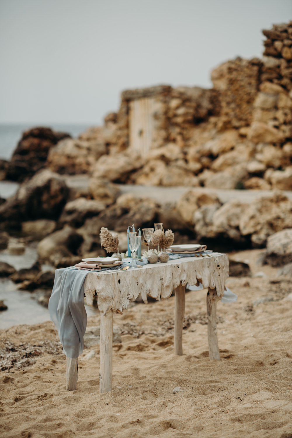 Outdoor Wild Nature Destination Spain Europe Coastal Beach Table Styling | Blue Ibiza Elopement Ideas and Surprise Proposal Serena Genovese Photography
