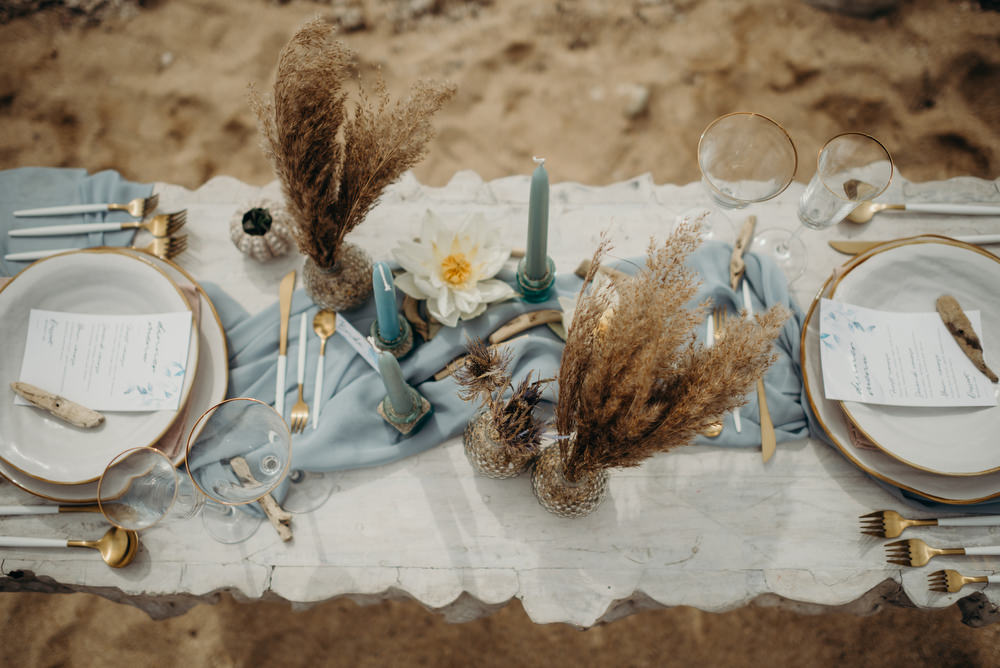Outdoor Wild Nature Destination Spain Europe Coastal Styled Shoot Beach Table Elegant Styling | Blue Ibiza Elopement Ideas and Surprise Proposal Serena Genovese Photography
