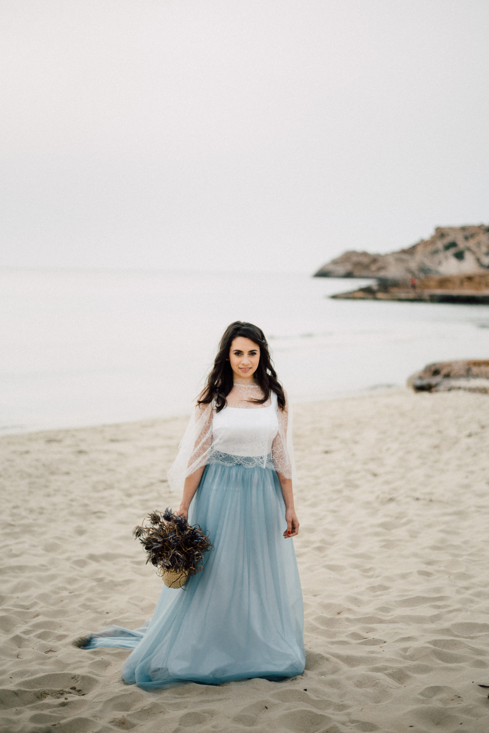 Outdoor Wild Nature Destination Spain Europe Coastal Styled Shoot Bride Blue Gown Lace | Blue Ibiza Elopement Ideas and Surprise Proposal Serena Genovese Photography