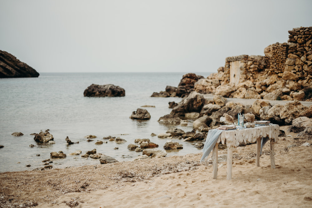 Outdoor Wild Nature Destination Spain Europe Coastal Beach Table Styling | Blue Ibiza Elopement Ideas and Surprise Proposal Serena Genovese Photography