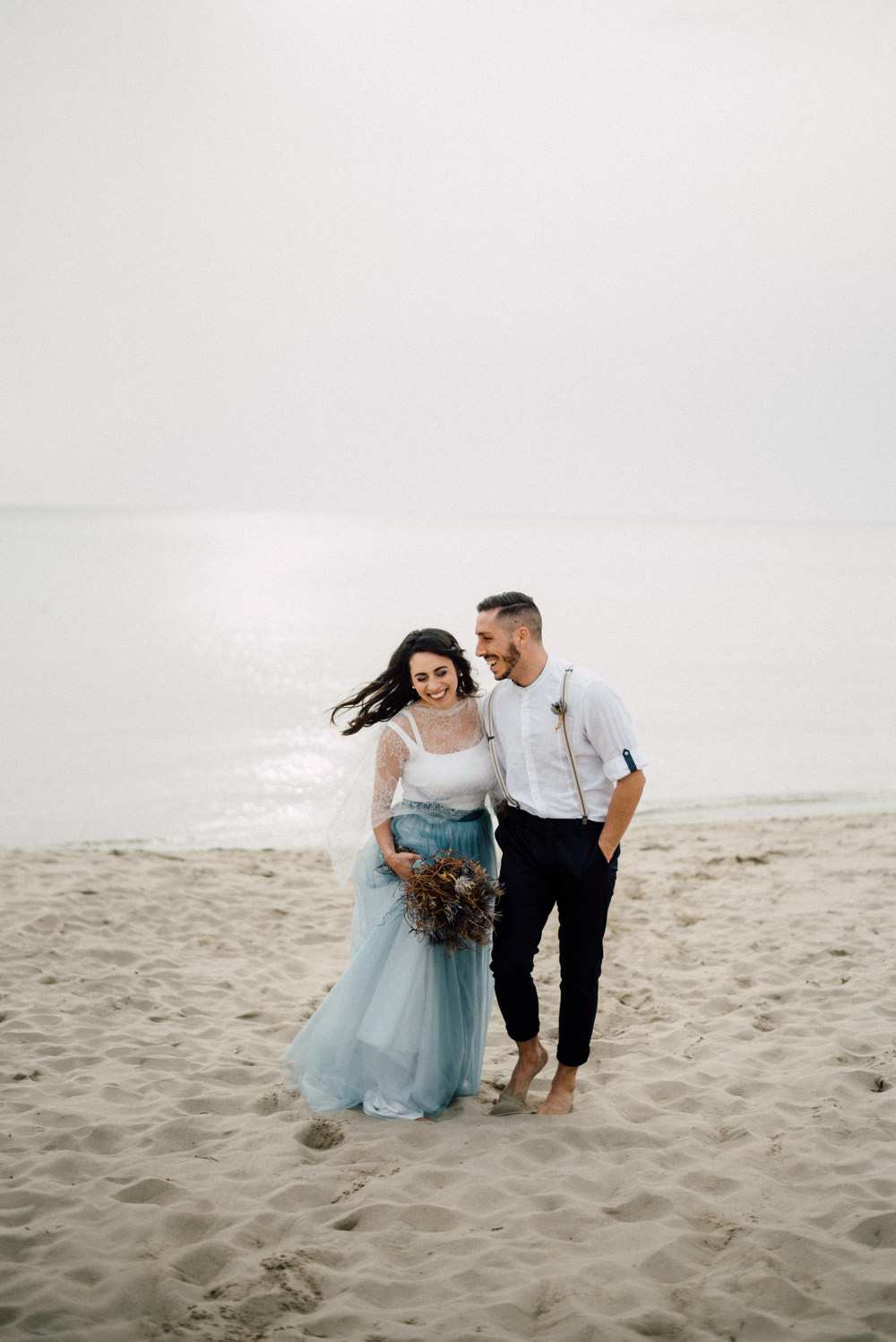 Outdoor Wild Nature Destination Spain Europe Beach Styled Shoot Groom Braces Bride Blue Gown Lace | Blue Ibiza Elopement Ideas and Surprise Proposal Serena Genovese Photography