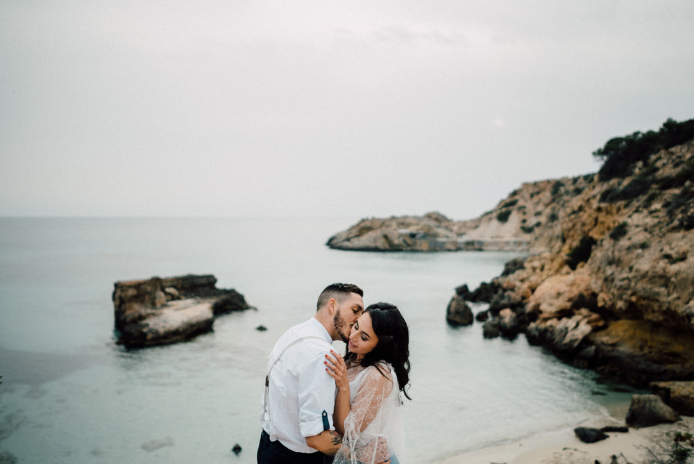Outdoor Wild Nature Destination Spain Europe Beach Styled Shoot Groom Braces Bride Blue Gown Lace | Blue Ibiza Elopement Ideas and Surprise Proposal Serena Genovese Photography