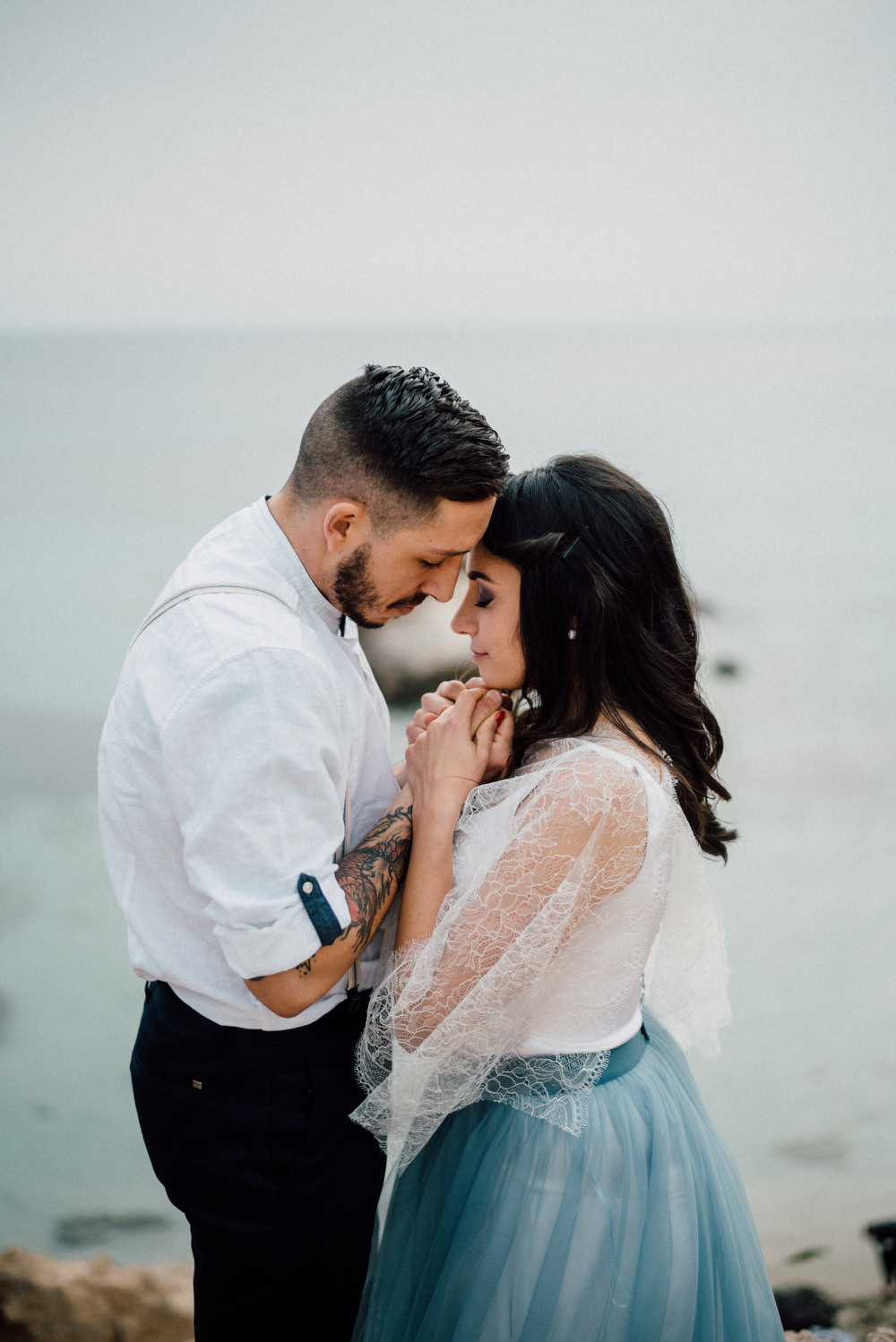 Outdoor Wild Nature Destination Spain Europe Beach Styled Shoot Groom Braces Bride Blue Gown Lace | Blue Ibiza Elopement Ideas and Surprise Proposal Serena Genovese Photography