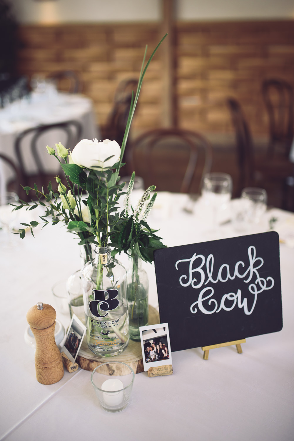 Flowers Greenery Foliage Cream Peony Peonies Rose Table Bottles Log Centrepiece Chalk Board Name Botanical Country Wedding Jenna Woodward Photography