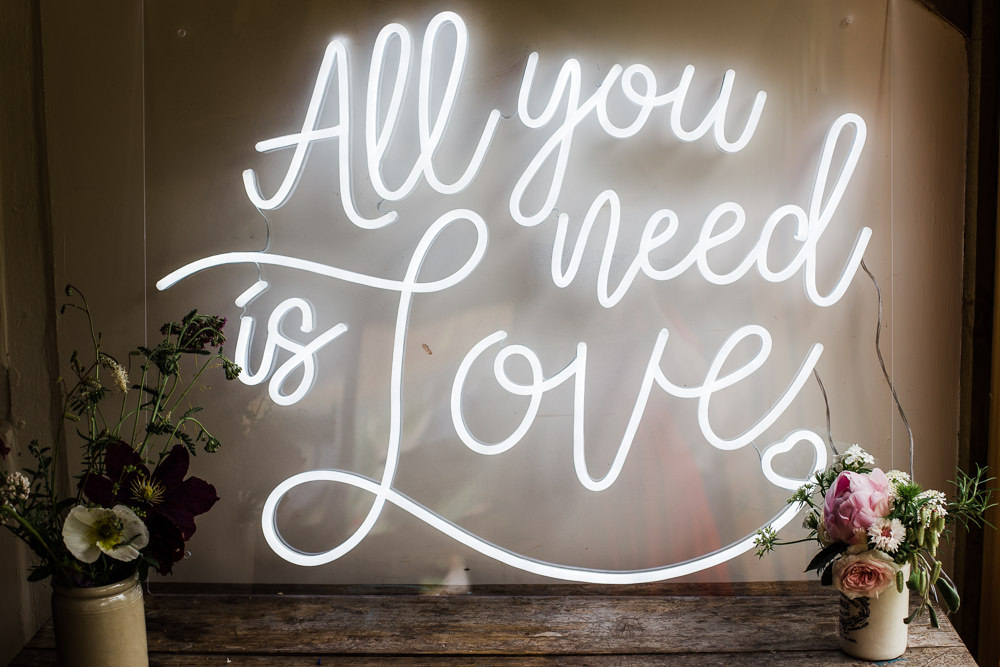 Neon Sign Love Quote Colourful Bohemian Floral Wedding Ideas Anna Beth Photography