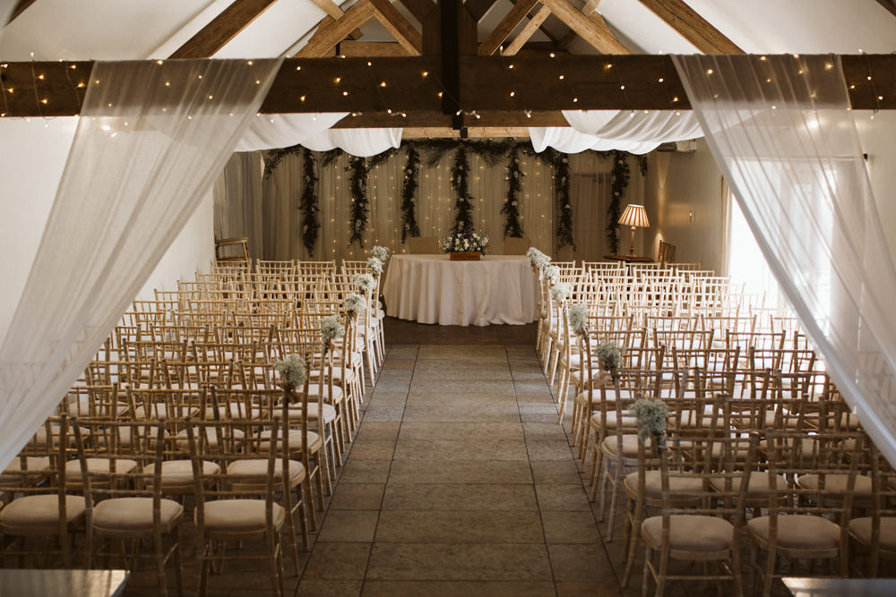 Travel Wine Inspired Rustic Outdoor Natural Farm Field Ceremony Aisle Chiavari Chairs Gypsophila Hanging Garlands | Farbridge Barn Wedding Jamie Dunn Photography