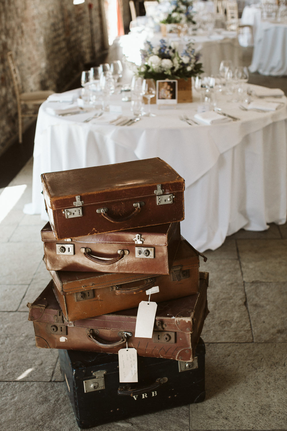 Travel Wine Inspired Rustic Outdoor Natural Farm Field Vintage Suitcases | Farbridge Barn Wedding Jamie Dunn Photography