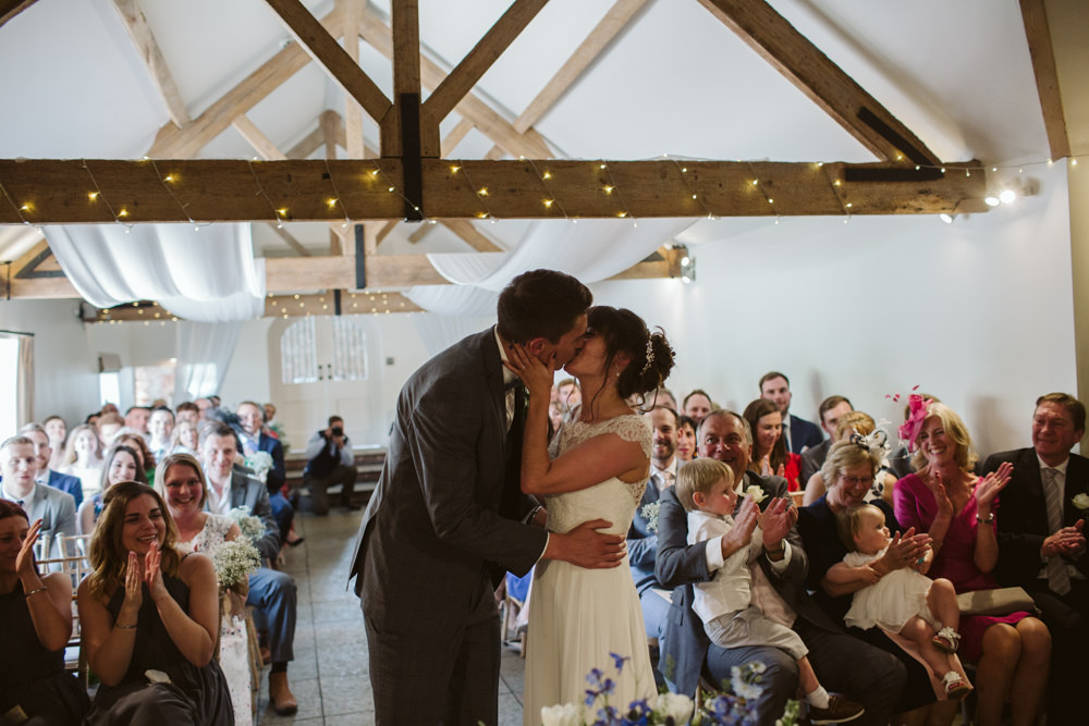 FTravel Wine Inspired Rustic Outdoor Natural Farm Field Bride Groom Kiss Ceremony Aisle | Farbridge Barn Wedding Jamie Dunn Photography