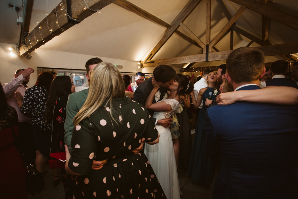 Travel Wine Inspired Rustic Outdoor Natural Farm Field Countryside Bride Groom Dancing Kiss | Farbridge Barn Wedding Jamie Dunn Photography