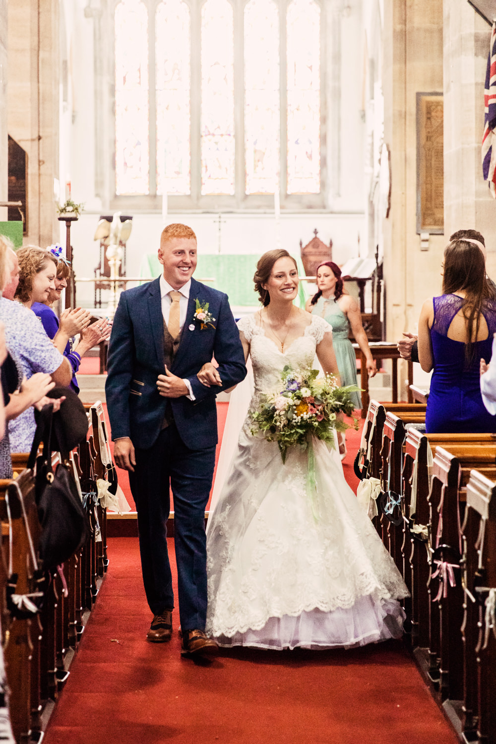 Bride Bridal Bespoke Dress Cape Sweetheart Neckline A Line Lace Tweed Mismatched Waistcoat Groom Wildflower Meadow Bouquet Festival Wedding Mismatched Country Camilla Lucinda Photography