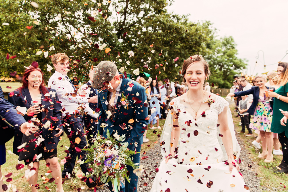 Bride Bridal Bespoke Dress Cape Sweetheart Neckline A Line Lace Tweed Mismatched Waistcoat Groom Confetti Festival Wedding Mismatched Country Camilla Lucinda Photography