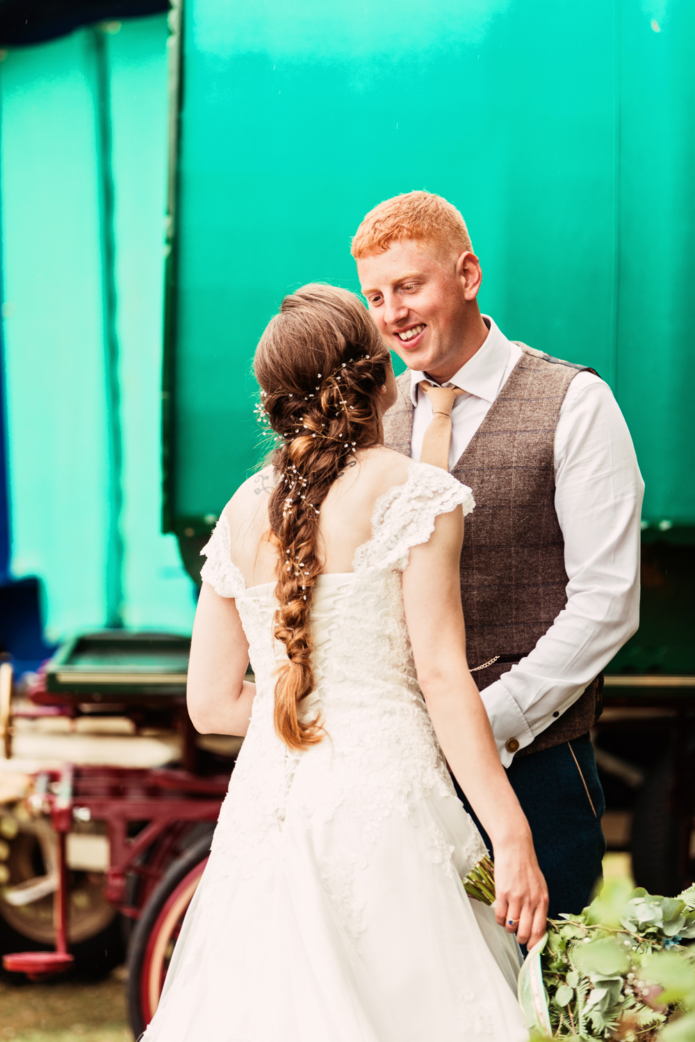 Bride Bridal Bespoke Dress Cape Sweetheart Neckline A Line Lace Tweed Mismatched Waistcoat Groom Plait Embellished Hair Decoration Festival Wedding Mismatched Country Camilla Lucinda Photography