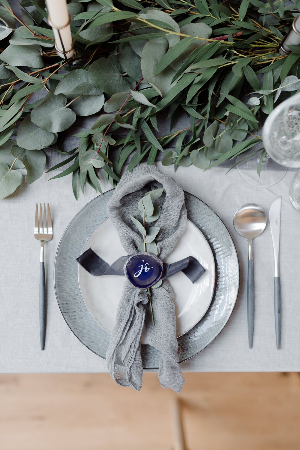 Agate Name Slice Calligraphy Place Setting Table Plates Cutlery Greenery Foliage Eucalyptus Ribbon Silk Napkin Grey Violet Wedding Ideas Chloe Ely Photography