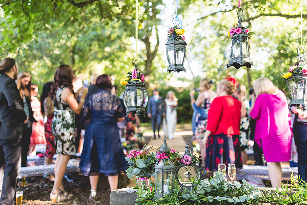 Hanging Lanterns Ceremony Table Flowers Hothorpe Hall Woodlands Wedding Lucy Long Photography