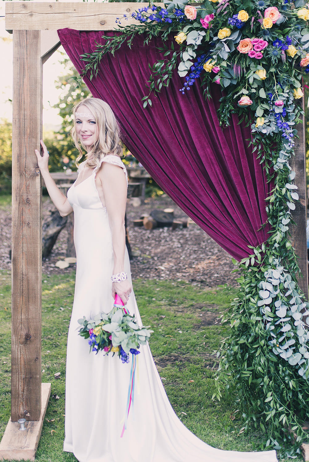 Flower Arch Florals Wooden Frame Multi Colour Colourful Backdrop Hothorpe Hall Woodlands Wedding Lucy Long Photography