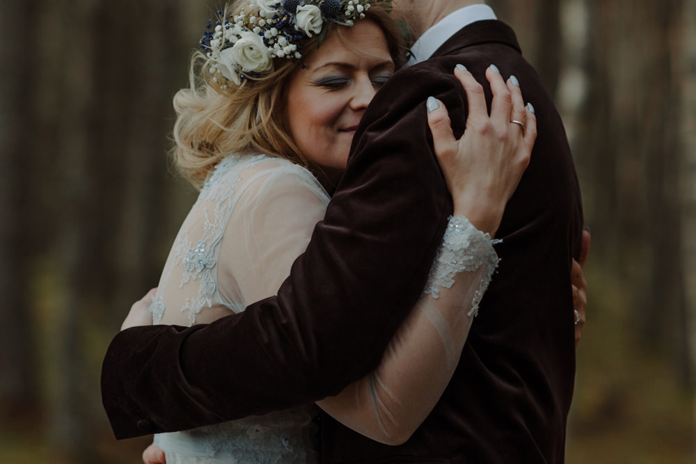 Forest Trees Castle Loch Bride Groom Blue Dress White Bouquet Floral Crown Cape Tan Coat | Intimate Winter Outdoor Scotland Wedding Christopher Ian Photography