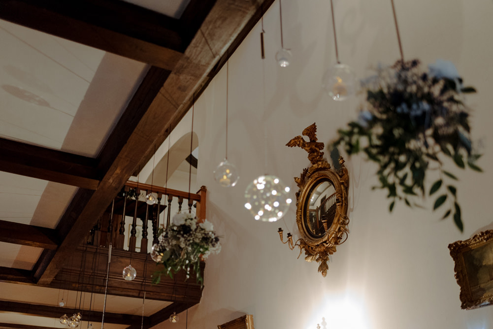 Forest Trees Castle Loch Simple Decor Greenery Fairy Lights Hanging Flowers | Intimate Winter Outdoor Scotland Wedding Christopher Ian Photography