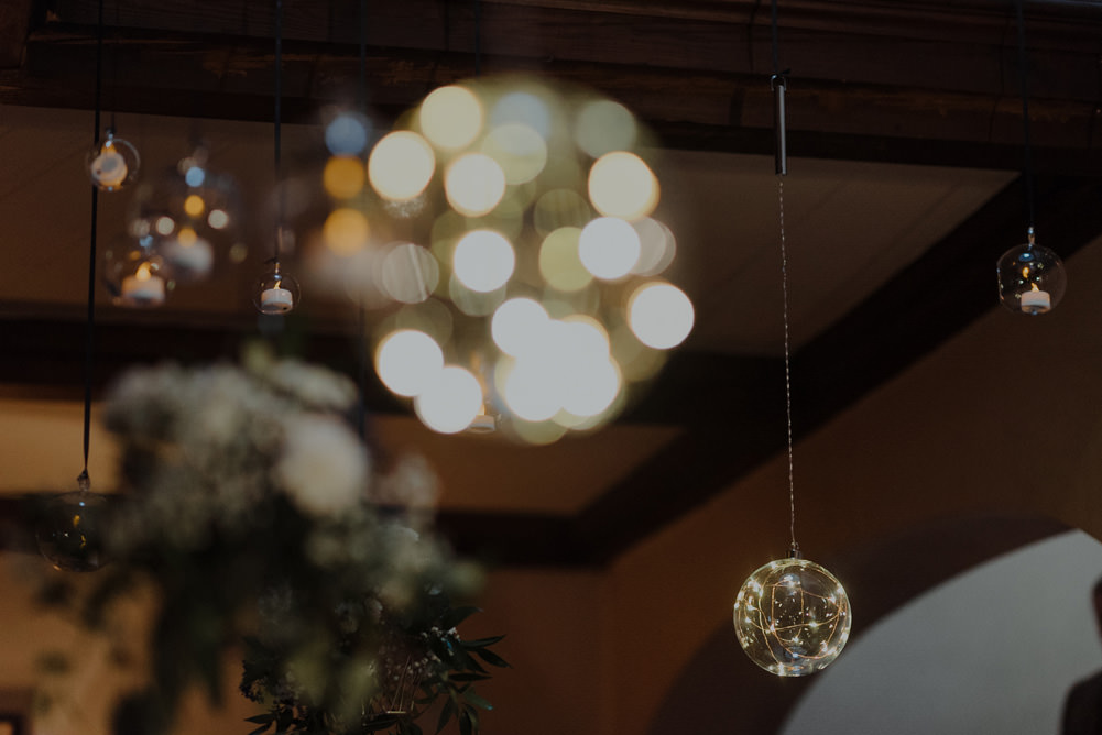 Forest Trees Castle Loch Simple Decor Greenery Fairy Lights Hanging Flowers | Intimate Winter Outdoor Scotland Wedding Christopher Ian Photography