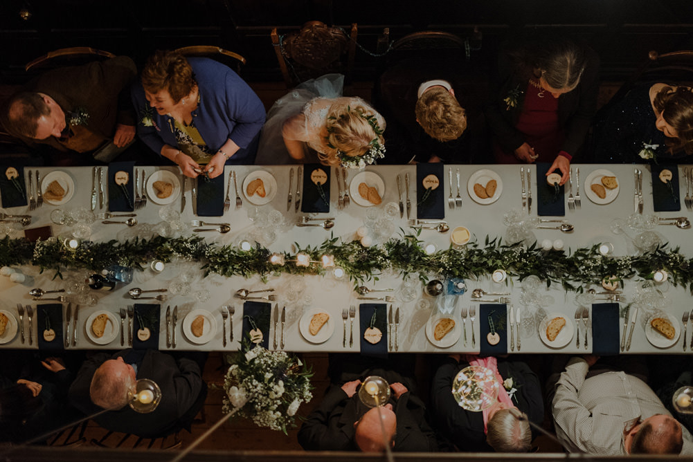 Forest Trees Castle Loch Simple Decor Greenery Fairy Lights Garland Runner Table Blue White | Intimate Winter Outdoor Scotland Wedding Christopher Ian Photography