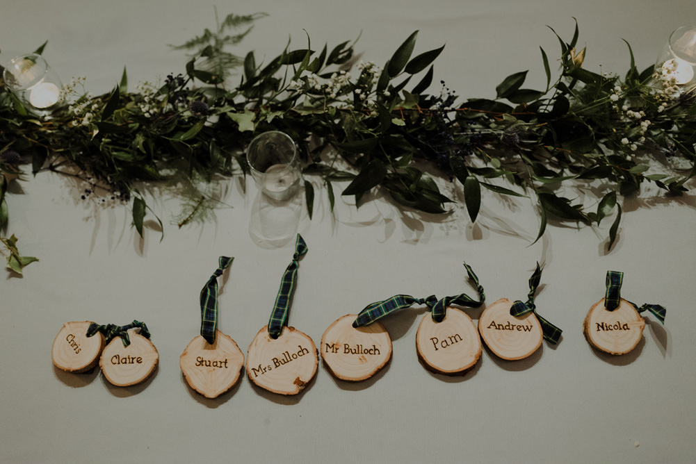 Forest Trees Castle Loch Simple Decor Greenery Fairy Lights Garland Runner Table Blue White Place Cards | Intimate Winter Outdoor Scotland Wedding Christopher Ian Photography