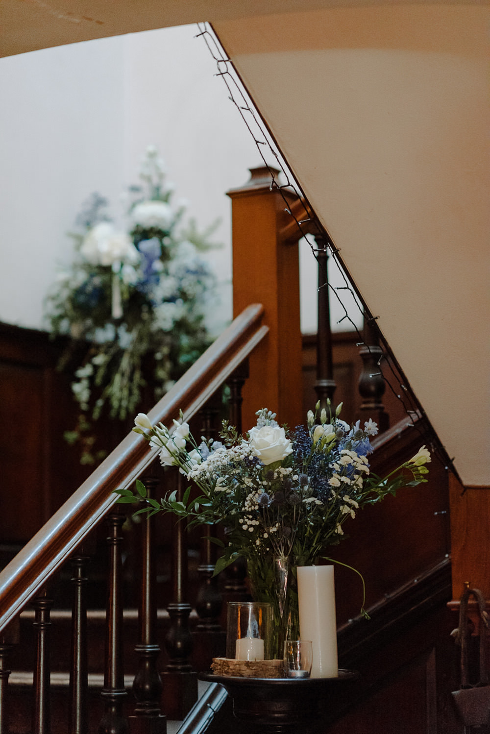 Forest Trees Castle Loch Simple Decor Greenery Fairy Lights Garland Runner Table Blue White | Intimate Winter Outdoor Scotland Wedding Christopher Ian Photography
