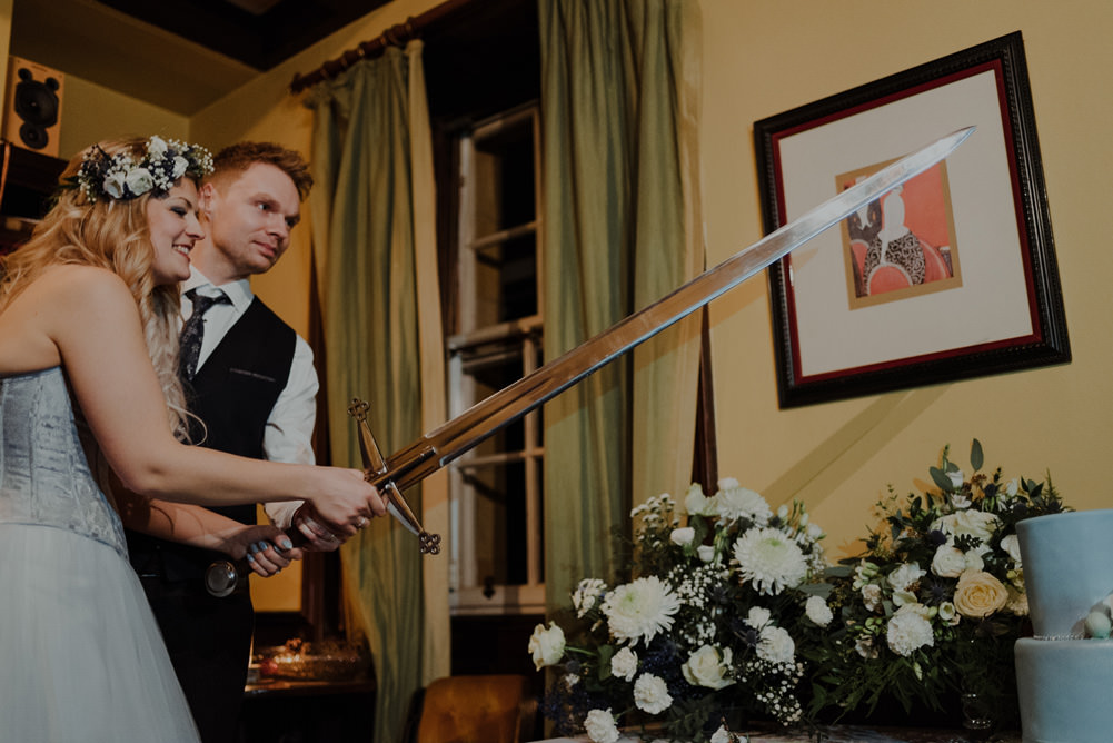 Forest Trees Castle Loch House Bride Blue Corset Bespoke Gown Groom Sword Cake Cutting | Intimate Winter Outdoor Scotland Wedding Christopher Ian Photography