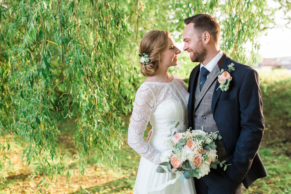 Bride Bridal Maggie Sottero Lace Long Sleeves A Line Navy Suit Groom Peach Rose Peony Eucalyptus Bouquet Tweed Waistcoat Moreves Barn Wedding Gemma Giorgio Photography
