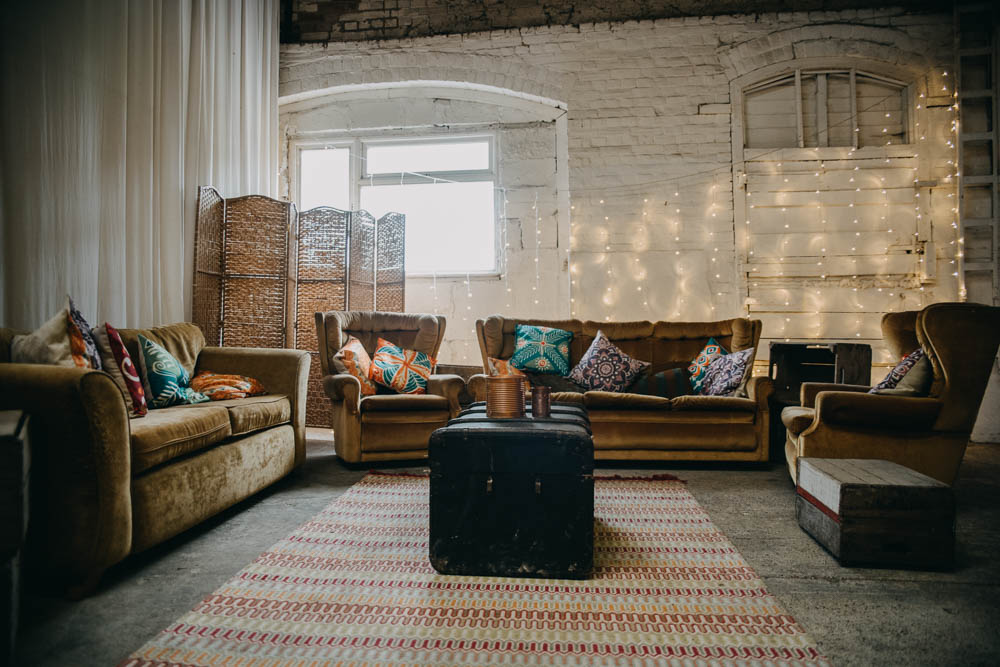 Relaxed Seating Area Occasional Rug Armchairs Vintage Railway Barn Wedding Lottie Photography