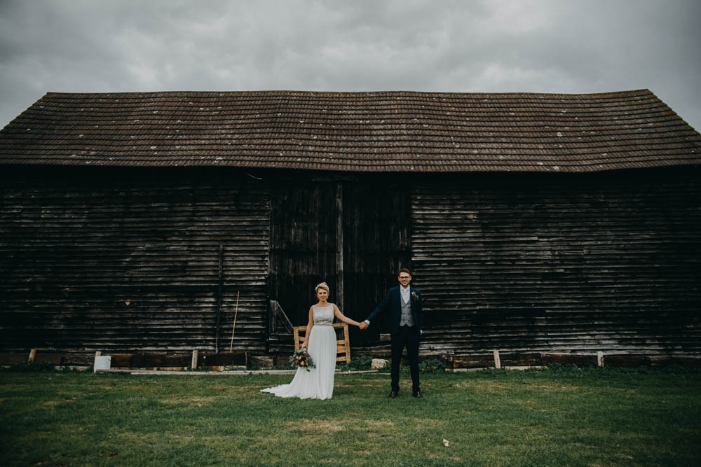 Bride Bridal Lace Dress Gown Train Tiara Veil Sequin Embellished Bouquet Navy Moss Bros Groom Railway Barn Wedding Lottie Photography