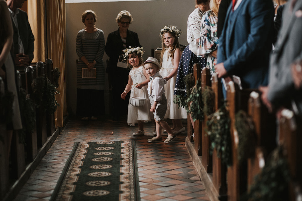 Outdoor Farm Field Rustic Garden Marquee Aisle Ceremony Foliage Runner Page Boy Flower Girl | Fun and Relaxed Scrivelsby Walled Garden Wedding Brook Rose Photography