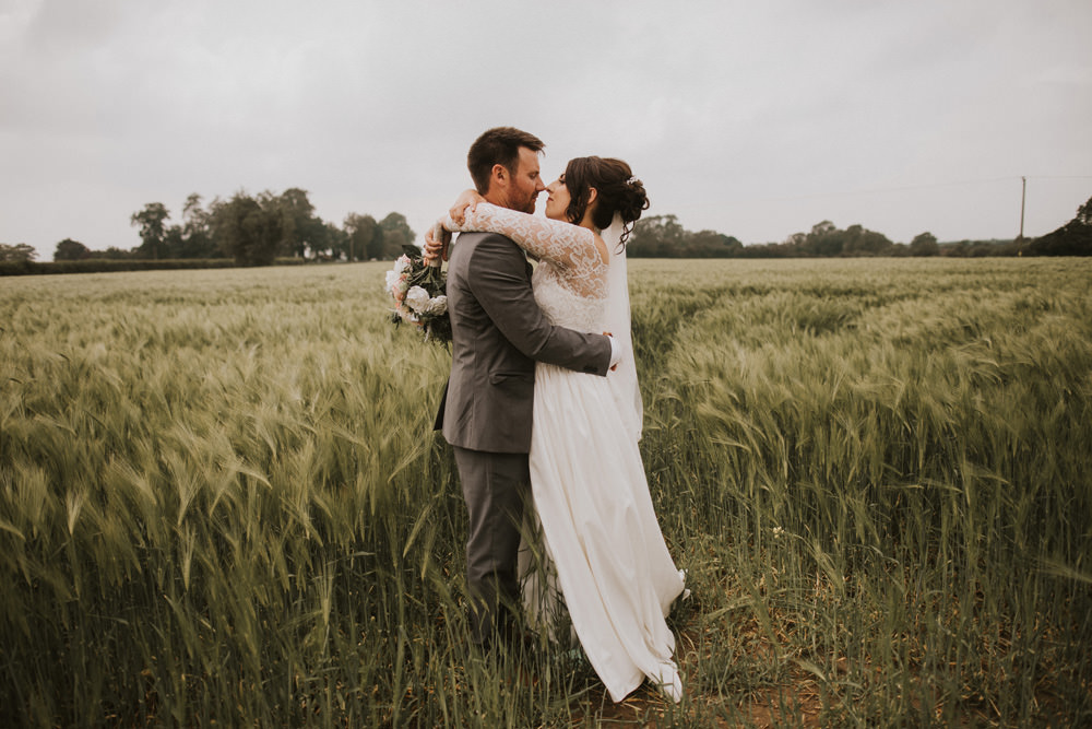 Outdoor Farm Field Wheat Rustic Garden Marquee Bride Bouquet Groom Lace Dress | Fun and Relaxed Scrivelsby Walled Garden Wedding Brook Rose Photography