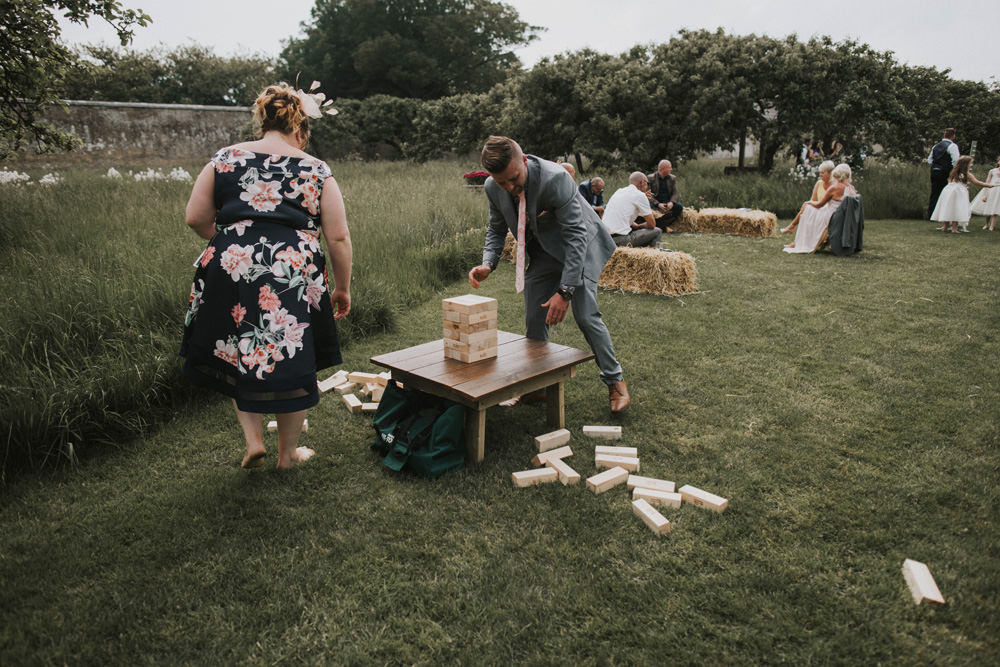 Outdoor Farm Field Wheat Rustic Garden Marquee Games Jenga Hay Bales | Fun and Relaxed Scrivelsby Walled Garden Wedding Brook Rose Photography